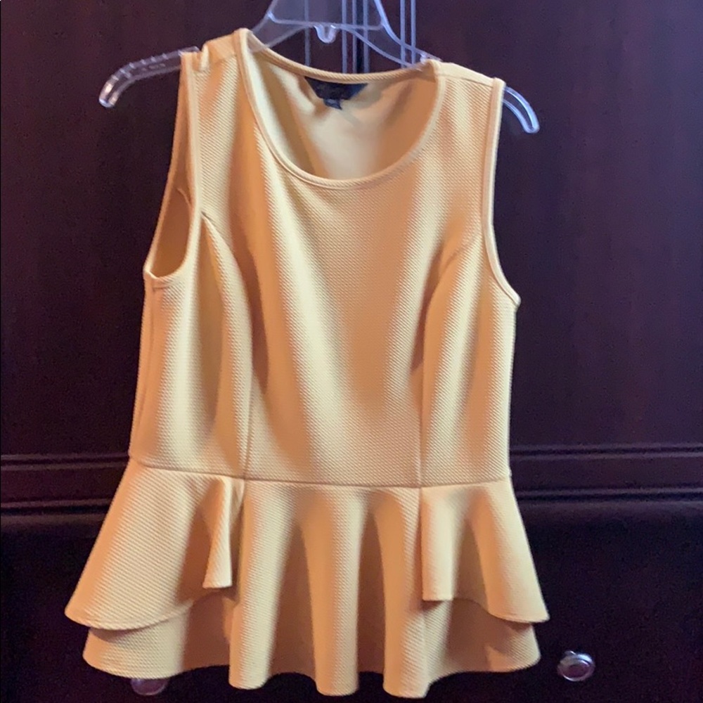 Bright yellow sleeveless top